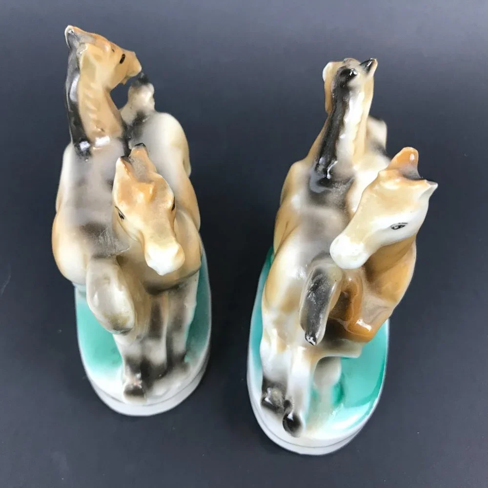 Two small antique horse figurines marked occupied Japan